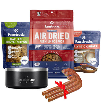 Image of New Dog Starter Pack - Holiday Bundle Pack showcasing the 3 Canine Candy Cane Treats, Daily Dental Chew Brush - Large (15 Pack), Air Dried Dog Beef Food (2lbs), a Stainless Steel 'Good Dog' Bowl, and Bully Stick Rings - 3 Pack